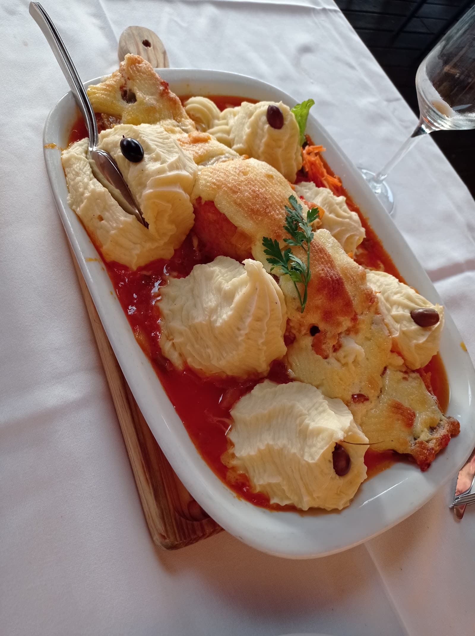 Bacalhau da casa com puré gratinado